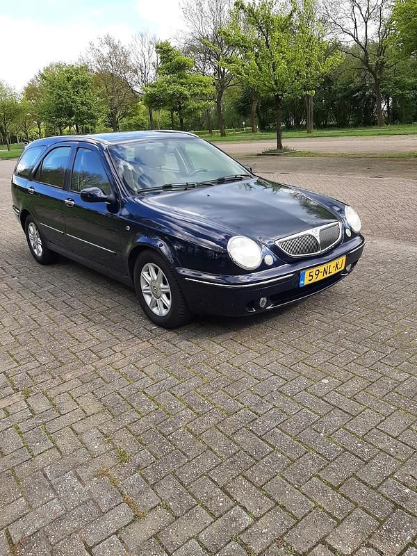 Blauw (metallic) Gebruikt 2003 Lancia Lybra Stationwagen | € 950 - Afbeelding 1/4