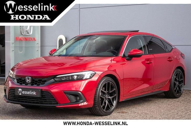 Rood, metallic lak Gebruikt 2023 Honda Civic Advance Hatchback | € 37.950 - Afbeelding 1/4