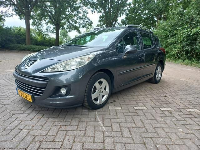 Grijs Gebruikt 2011 Peugeot 207 Stationwagen | € 2.750 (Goede deal) - Afbeelding 1/4
