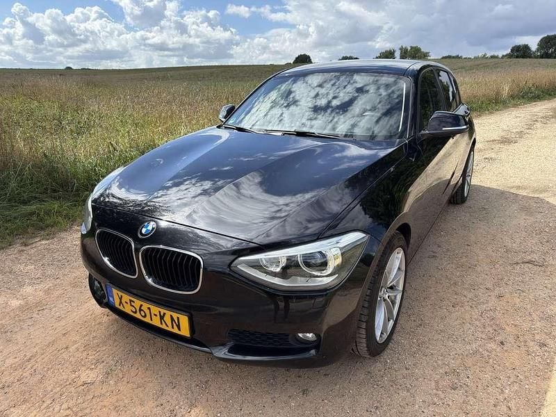 Zwart Gebruikt 2012 BMW 116 Hatchback | € 7.350 (Goede deal) - Afbeelding 1/4