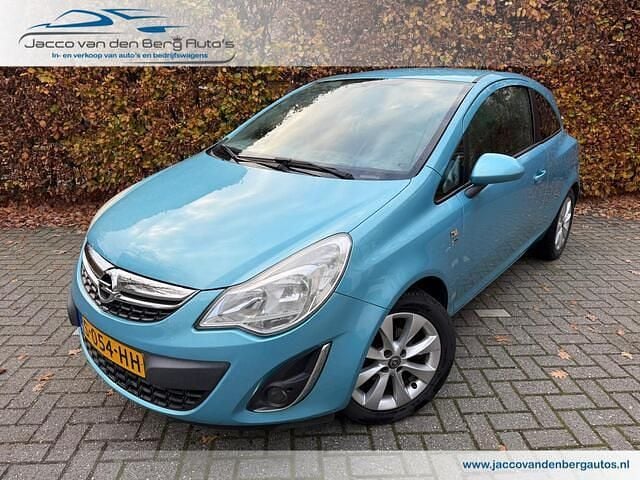 Blauw (metallic) Gebruikt 2012 Opel Corsa Hatchback | € 3.750 (Goede deal) - Afbeelding 1/4