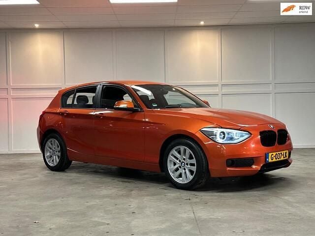 Oranje Gebruikt 2013 BMW 116 Hatchback | € 9.450 (Goede deal) - Afbeelding 1/4