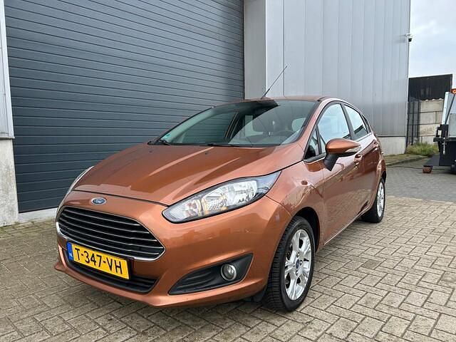 Occasion Ford Fiesta Titanium 101 PK (74 kW) 2013 Oranje Hatchback