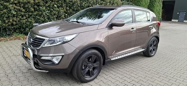 Bruin Gebruikt 2013 Kia Sportage Plus SUV | € 9.250 (Goede deal) - Afbeelding 1/4