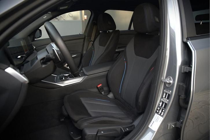 Occasion BMW 330 M Performance 245 PK (180 kW) 2024 Grijs Stationwagen