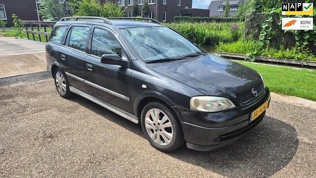 Zwart Gebruikt 1999 Opel Astra Club Stationwagen | € 1.450 (Eerlijke prijs) - Afbeelding 1/4