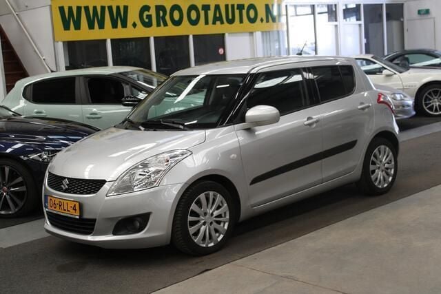 Grijs Gebruikt 2011 Suzuki Swift Exclusive Hatchback | € 7.744 (Goede deal) - Afbeelding 1/4