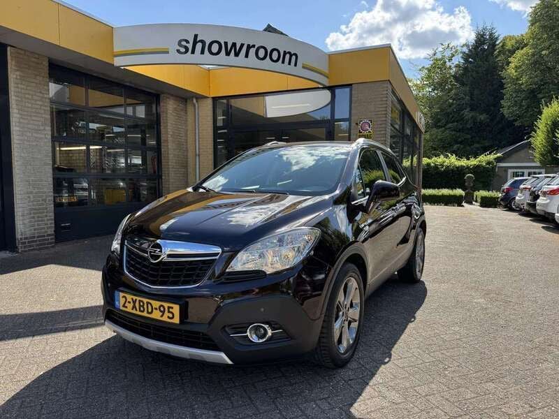 Bruin, metallic lak Gebruikt 2014 Opel Mokka Cosmo SUV | € 10.495 (Eerlijke prijs) - Afbeelding 1/4