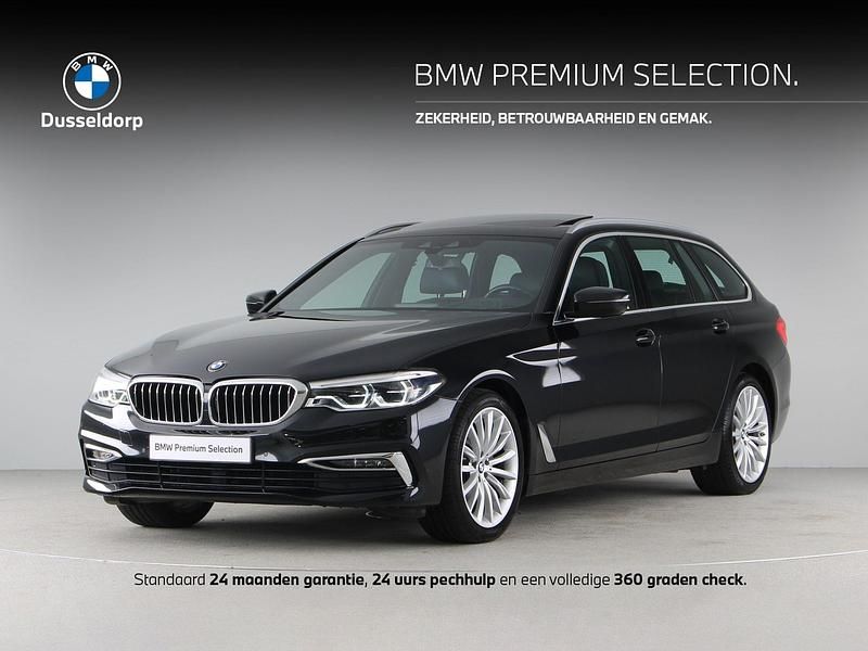 Zwart Occasion 2019 BMW 520 Stationwagen | € 34.900 - Afbeelding 1/4