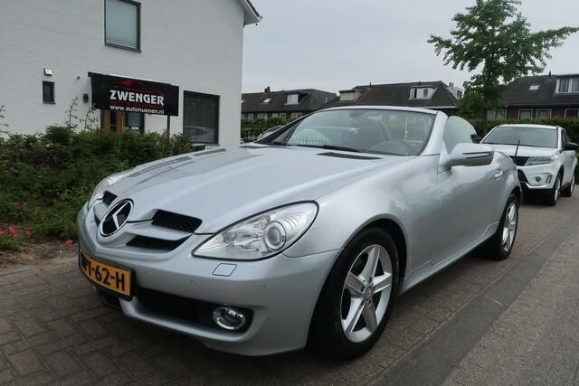 Grijs Gebruikt 2009 Mercedes SLK200 Cabriolet | € 11.750 (Eerlijke prijs) - Afbeelding 1/4