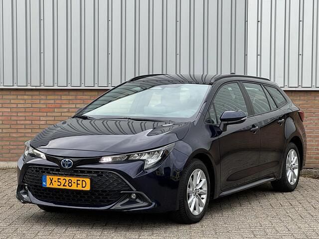 Blauw Gebruikt 2023 Toyota Corolla Active Stationwagen | € 22.950 (Goede deal) - Afbeelding 1/4