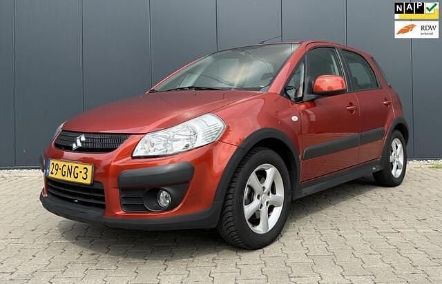 Oranje Gebruikt 2008 Suzuki SX4 Exclusive MPV | € 4.495 (Eerlijke prijs) - Afbeelding 1/4