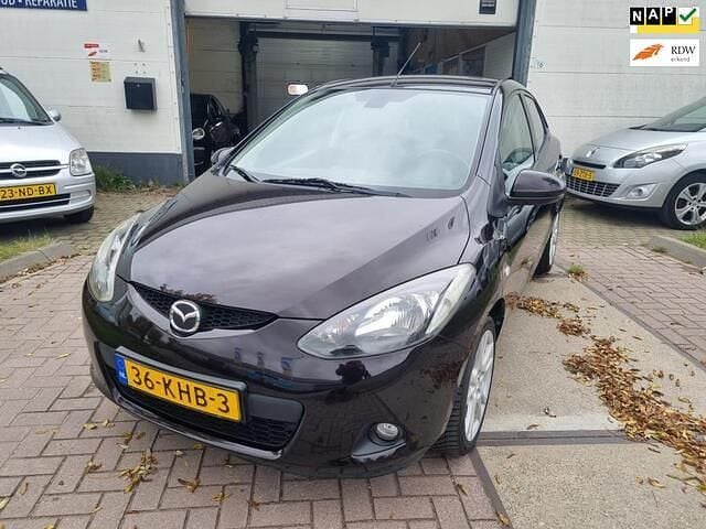Bruin Gebruikt 2009 Mazda 2 Hatchback | € 4.350 (Eerlijke prijs) - Afbeelding 1/4