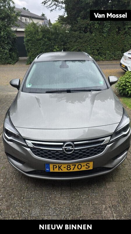 Grijs Gebruikt 2017 Opel Astra Edition Stationwagen | € 12.400 (Eerlijke prijs) - Afbeelding 1/4
