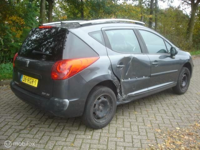 Grijs, metallic lak Gebruikt 2007 Peugeot 207 Stationwagen | € 875 (Goede deal) - Afbeelding 1/4