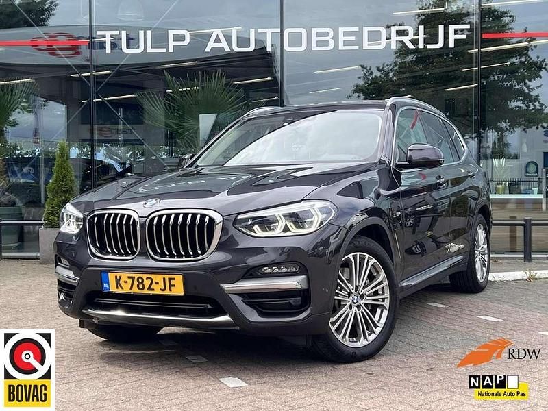 Grijs, metallic lak Gebruikt 2021 BMW X3 Luxury Line SUV | € 32.940 (Super prijs) - Afbeelding 1/4