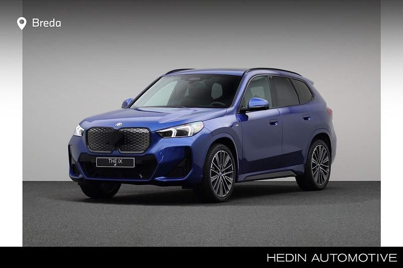 Blauw Gebruikt 2024 BMW iX1 Comfort Edition SUV | € 52.880 - Afbeelding 1/4