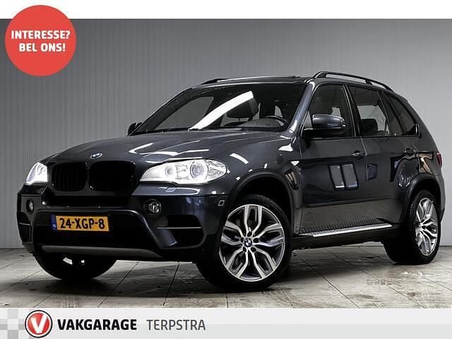 Grijs (metallic) Gebruikt 2012 BMW X5 Executive SUV | € 13.995 (Eerlijke prijs) - Afbeelding 1/4