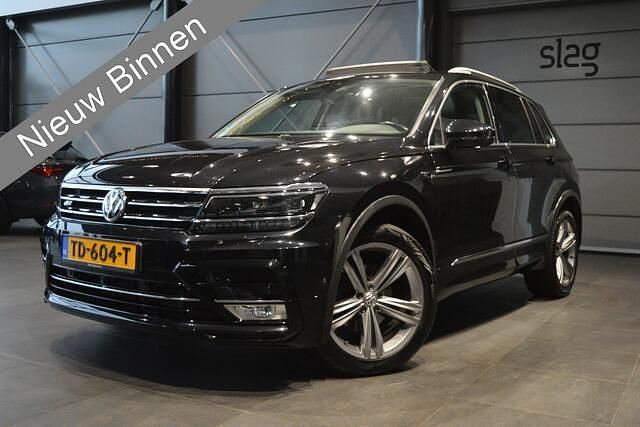Zwart Gebruikt 2017 VW Tiguan Highline SUV | € 26.900 (Eerlijke prijs) - Afbeelding 1/4