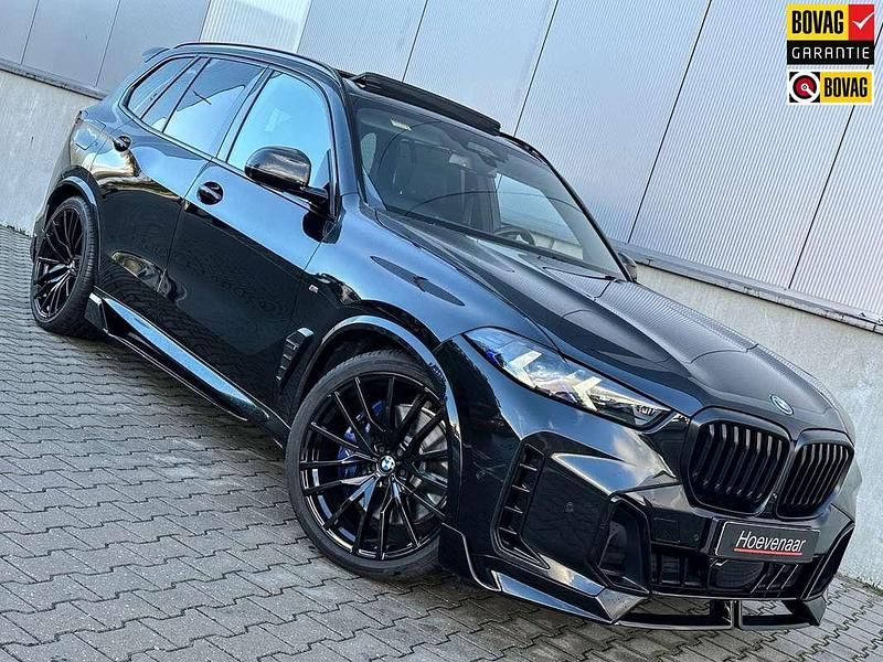 Zwart Occasion 2023 BMW X5 M Sport SUV | € 93.999 - Afbeelding 1/4