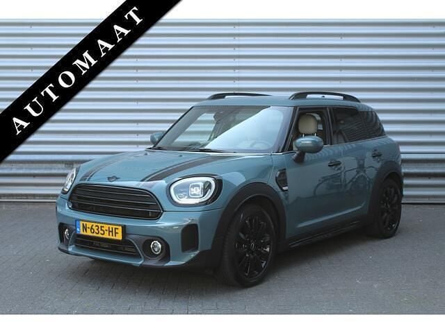 Groen, metallic lak Gebruikt 2021 Mini Countryman Business SUV | € 26.950 - Afbeelding 1/4