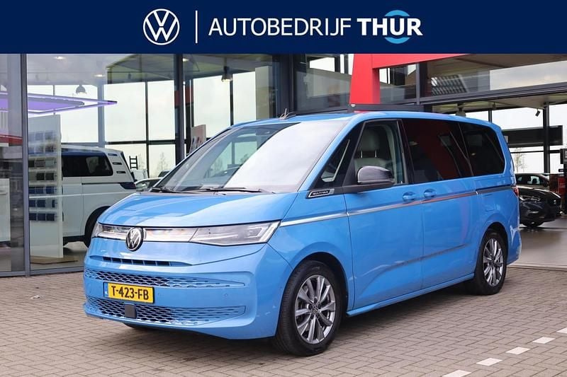 Blauw Gebruikt 2023 VW Multivan Style Van | € 59.950 (Duur) - Afbeelding 1/4