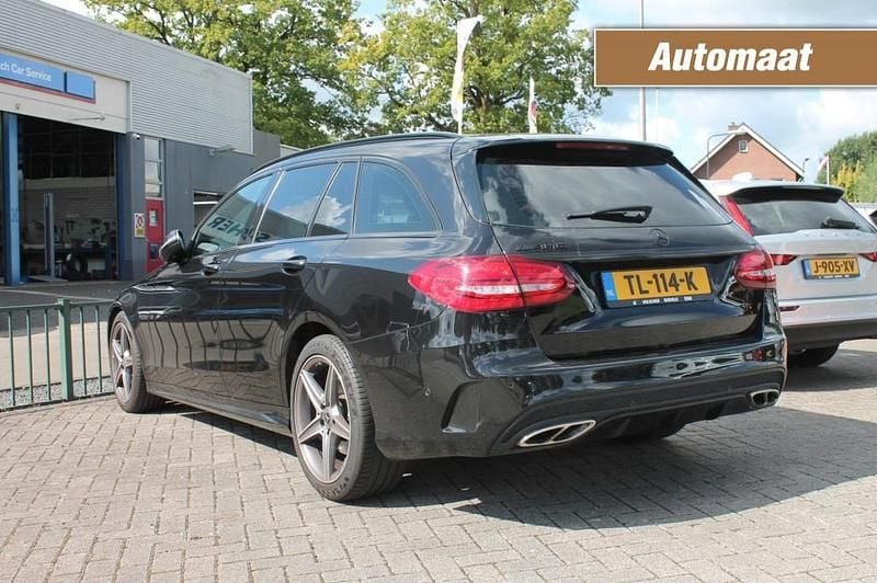 Zwart Gebruikt 2018 Mercedes C180 AMG Stationwagen | € 24.650 (Eerlijke prijs) - Afbeelding 1/4