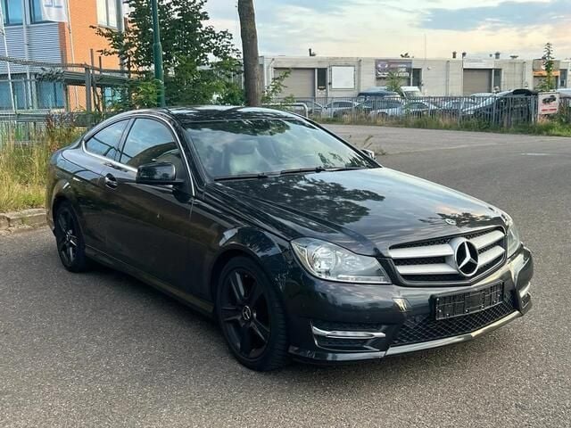 Occasion Mercedes C180 AMG 156 PK (114 kW) 2012 Zwart Coupé