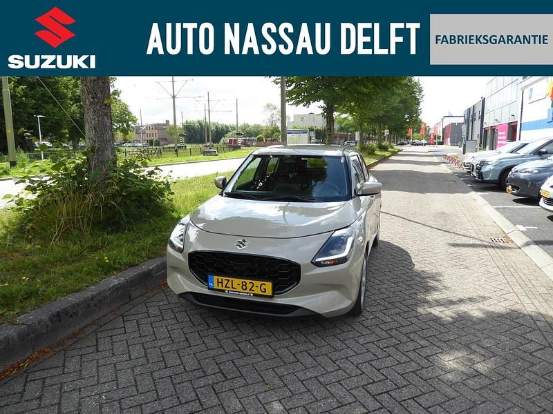 Bruin Gebruikt 2024 Suzuki Swift Hatchback | € 19.950 (Eerlijke prijs) - Afbeelding 1/4