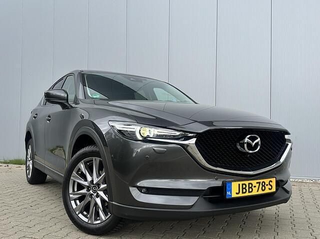 Grijs (metallic) Gebruikt 2020 Mazda CX-5 Signature SUV | € 27.990 (Goede deal) - Afbeelding 1/4