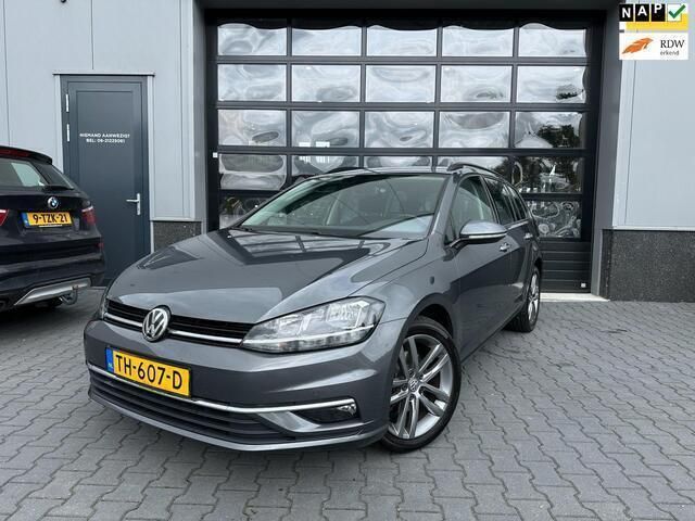 Grijs, metallic lak Gebruikt 2018 VW Golf VII Comfortline Stationwagen | € 9.950 (Goede deal) - Afbeelding 1/4