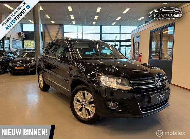 Zwart Occasion 2013 VW Tiguan Edition SUV | € 11.250 (Goede deal) - Afbeelding 1/4
