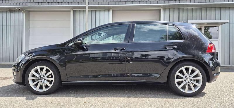 Zwart Gebruikt 2015 VW Golf VII Highline Stationwagen | € 11.999 (Super prijs) - Afbeelding 1/4