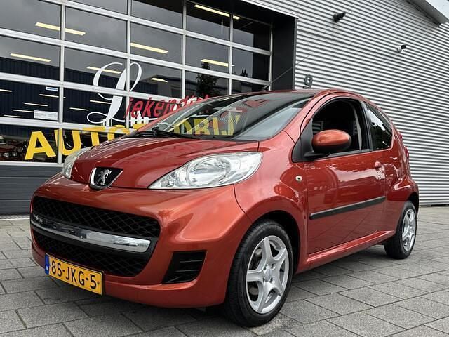 Oranje Gebruikt 2009 Peugeot 107 Comfort Hatchback | € 3.250 (Eerlijke prijs) - Afbeelding 1/4
