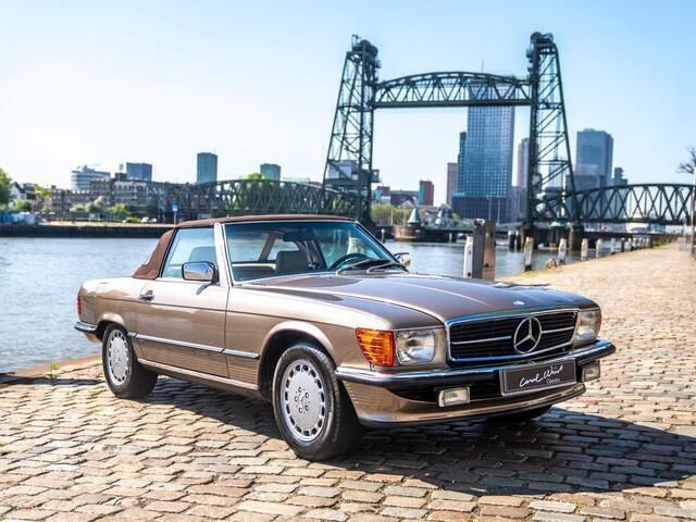 Bruin Gebruikt 1988 Mercedes 560 | € 47.500 - Afbeelding 1/4
