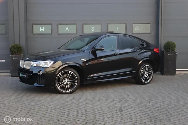 Zwart Gebruikt 2016 BMW X4 Executive SUV | € 24.740 (Eerlijke prijs) - Afbeelding 1/4