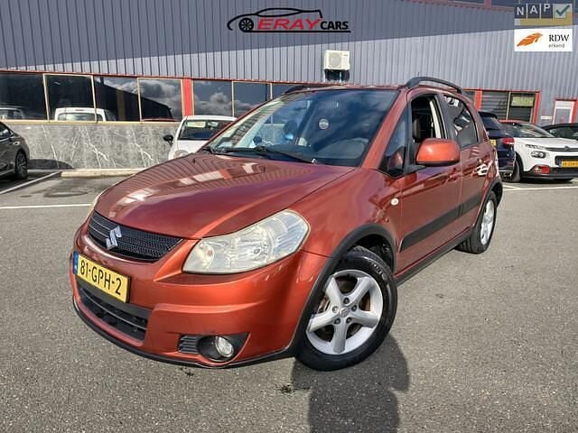 Oranje Gebruikt 2008 Suzuki SX4 MPV | € 2.799 (Eerlijke prijs) - Afbeelding 1/4