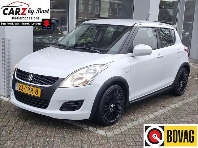 Wit (parellak) Occasion 2012 Suzuki Swift Comfort Hatchback | € 5.945 (Eerlijke prijs) - Afbeelding 1/4