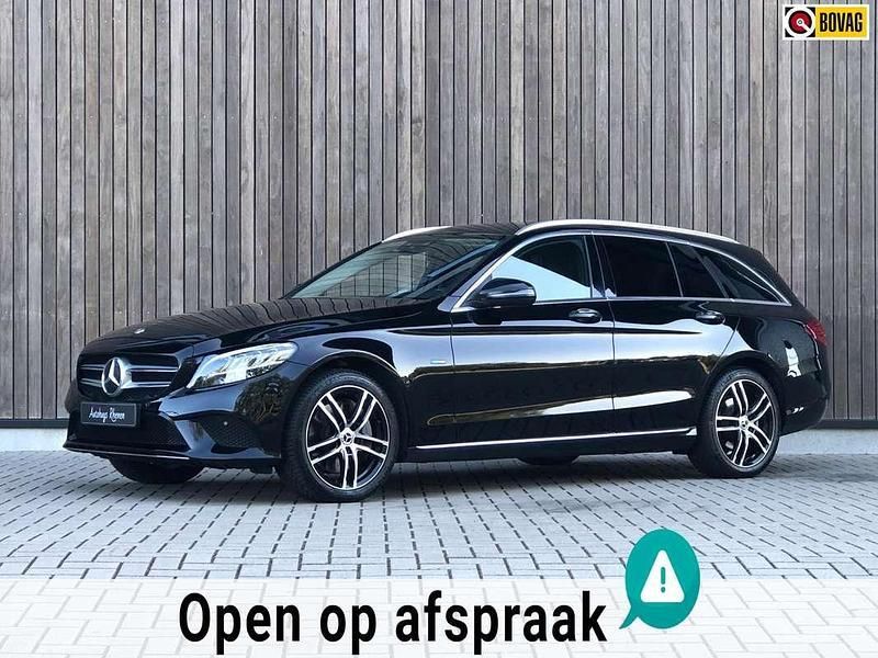 Zwart, metallic lak Gebruikt 2021 Mercedes C300e Stationwagen | € 22.900 - Afbeelding 1/4
