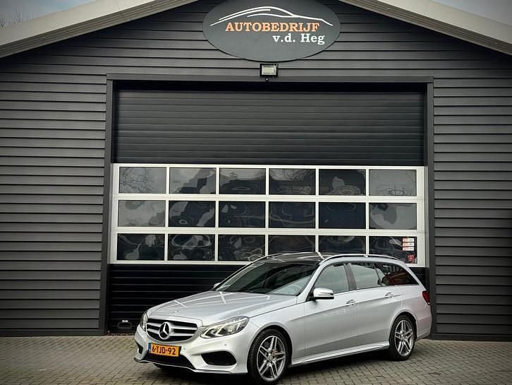 Grijs (metallic) Occasion 2013 Mercedes E350 AMG Stationwagen | € 25.900 (Duur) - Afbeelding 1/4