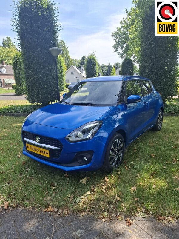, metallic lak Gebruikt 2023 Suzuki Swift Comfort Hatchback | € 17.900 (Eerlijke prijs) - Afbeelding 1/4