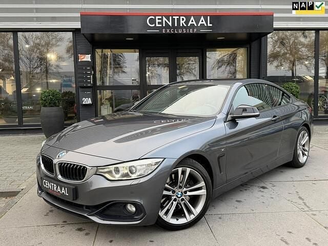 Grijs (metallic) Gebruikt 2014 BMW 428 Sport Line Coupé | € 16.950 (Goede deal) - Afbeelding 1/4