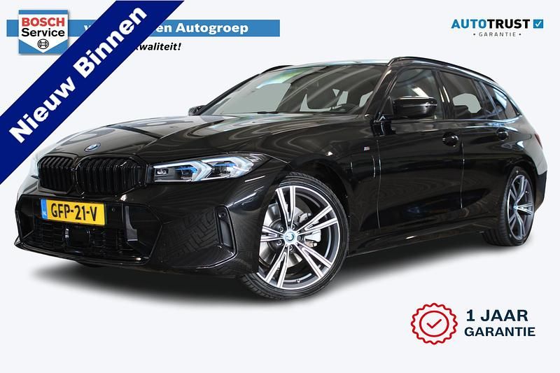 Zwart Gebruikt 2024 BMW 320e M Sport Stationwagen | € 42.950 (Eerlijke prijs) - Afbeelding 1/4