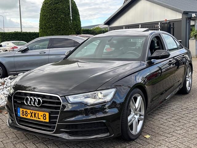 Bruin Gebruikt 2012 Audi A6 S-Line Sedan | € 17.950 (Eerlijke prijs) - Afbeelding 1/4