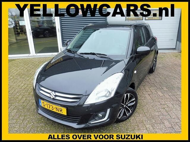 Zwart (metallic) Occasion 2017 Suzuki Swift X-TRA Hatchback | € 8.949 (Eerlijke prijs) - Afbeelding 1/4