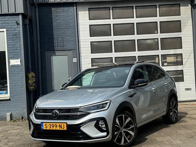 Grijs Gebruikt 2022 VW Taigo Business SUV | € 27.495 (Eerlijke prijs) - Afbeelding 1/4