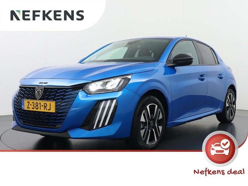 Blauw Gebruikt 2024 Peugeot e-208 Style Hatchback | € 21.725 (Eerlijke prijs) - Afbeelding 1/4