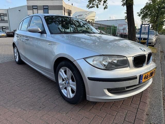 Grijs Gebruikt 2009 BMW 118 Hatchback | € 3.850 (Goede deal) - Afbeelding 1/4