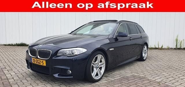 Zwart Gebruikt 2012 BMW 530 Executive Stationwagen | € 9.945 (Eerlijke prijs) - Afbeelding 1/4