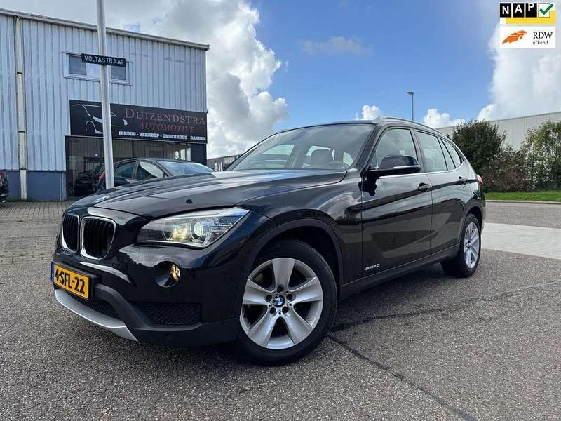 Zwart Gebruikt 2013 BMW X1 Executive SUV | € 13.450 (Iets duurder) - Afbeelding 1/4